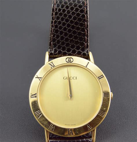 men's gucci wrist watch black face gold numerals|gucci necklace for men.